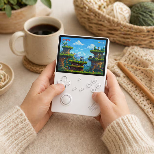 Adult hands holding the iGameConsole RG40XX V white portable handheld console, showing its compact vertical design, comfortable grip, D-pad, joystick, ABXY buttons, and colorful retro game screen.