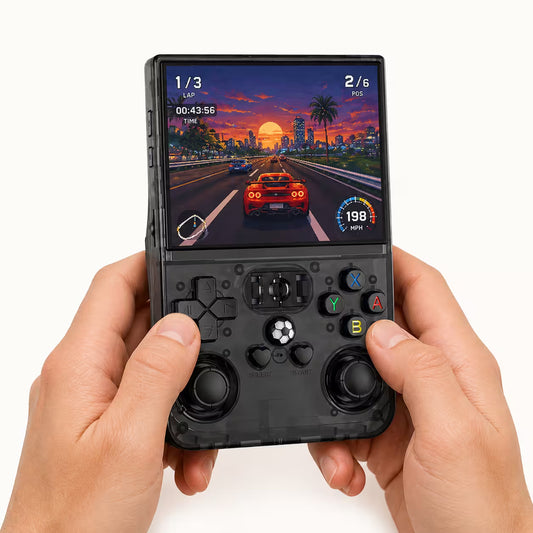 Adult hands holding the iGameConsole R36PRO transparent smoke black portable handheld console, showing its compact vertical design, black D-pad, colorful ABXY buttons, dual analog sticks, and racing game screen.