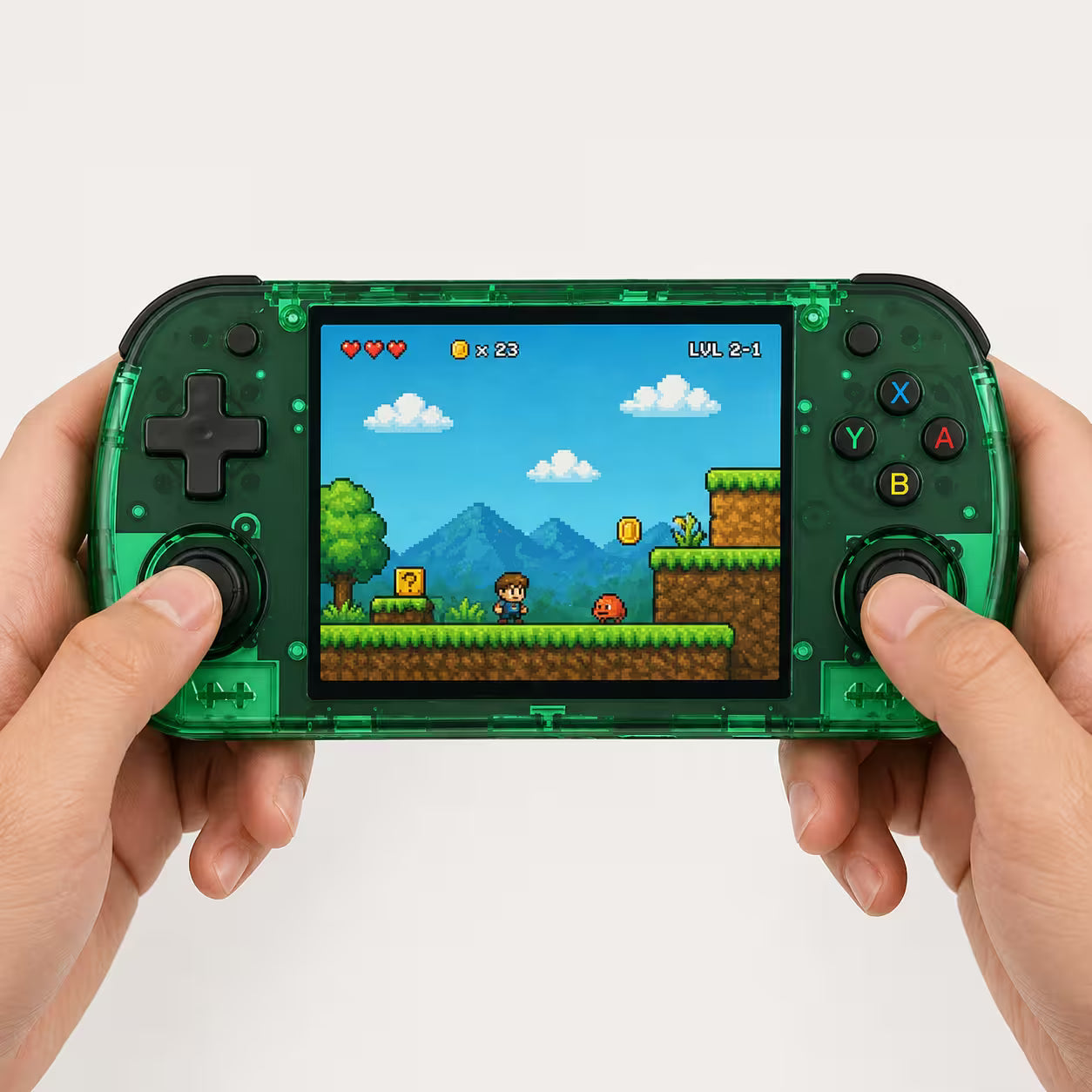 Adult hands holding the iGameConsole R36H Promax transparent green portable handheld console, showing its compact horizontal design, dual joysticks, black D-pad, colorful ABXY buttons, and retro pixel platform game screen.
