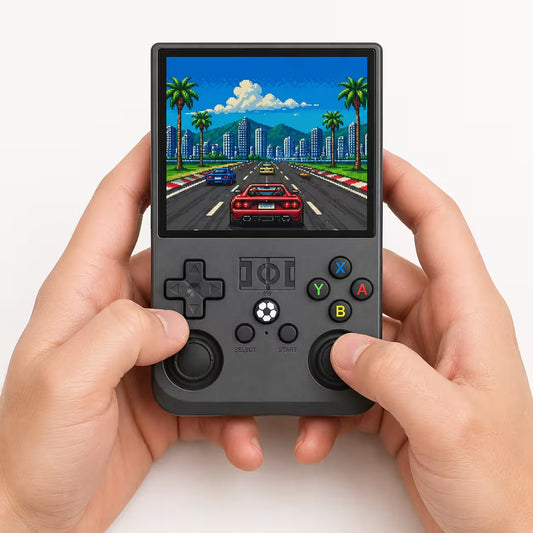 Adult hands holding the iGameConsole R36MAX matte black portable handheld console, showing its compact vertical design, black D-pad, colorful ABXY buttons, dual analog sticks, and retro racing game screen.