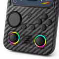 Close-up of the iGameConsole R36T MAX carbon fiber black handheld console showing the directional pad, ABXY buttons, center function buttons, dual RGB-ring joysticks, speaker grille, and textured shell details.
