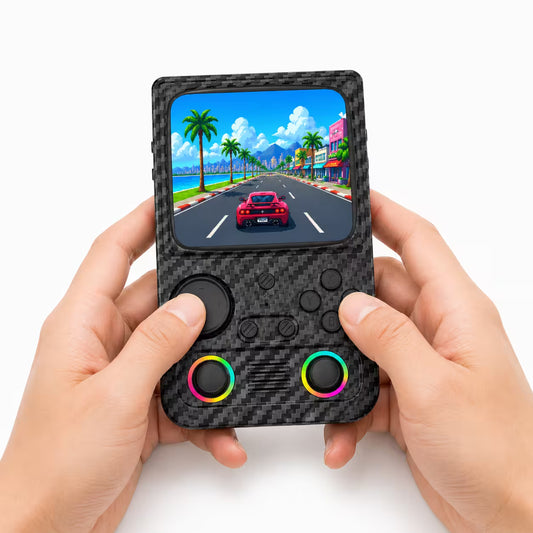 Adult hands holding the iGameConsole R36T MAX carbon fiber black portable handheld console, showing its compact vertical design, upper-left directional pad, ABXY buttons, dual RGB-ring joysticks, and colorful racing game screen.