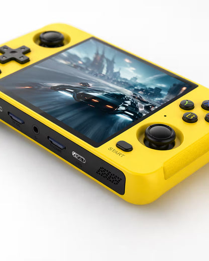 Close-up of the iGameConsole R40S bright yellow handheld console showing the dual joysticks, D-pad, colorful ABXY buttons, front ports, speaker grilles, and clean yellow shell details.