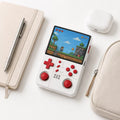iGameConsole R40XX Pro Max white and red compact retro handheld console beside everyday carry items including a notebook, pen, earbuds case, and pouch, showing portable size and daily carry convenience.