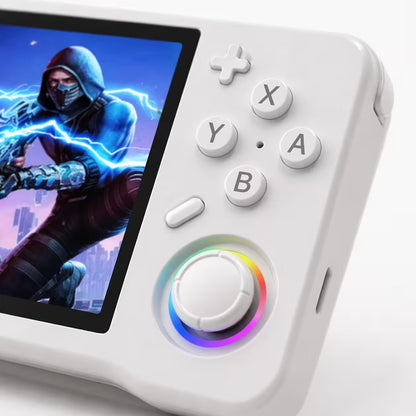 Close-up of the iGameConsole XF35H white handheld console showing the ABXY buttons, D-pad, dual RGB-ring joysticks, screen edge, and clean matte shell finish.