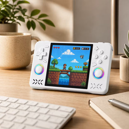 iGameConsole XF40H WiFi Pro white retro portable console on a clean modern desk setup with a keyboard, coffee mug, notebook, plant, and colorful pixel game screen.